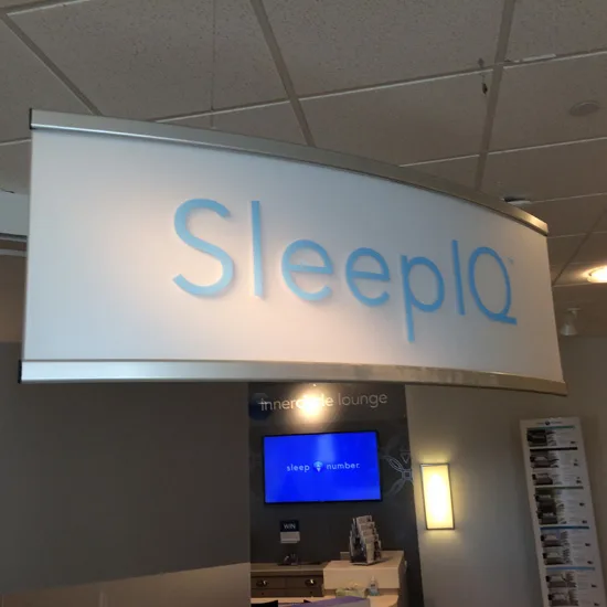Backlit curved SleepIQ sign